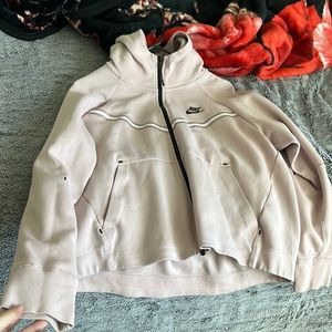 Pink women’s Nike tech